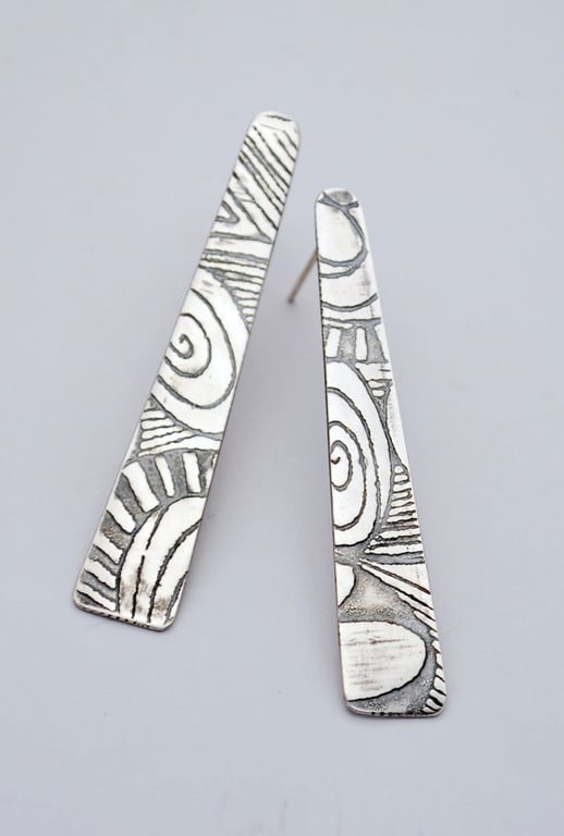 Flat silver stud drop earrings