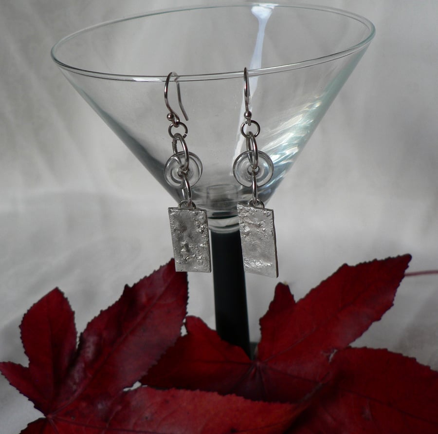 Silver earrings with a rock crystal donut