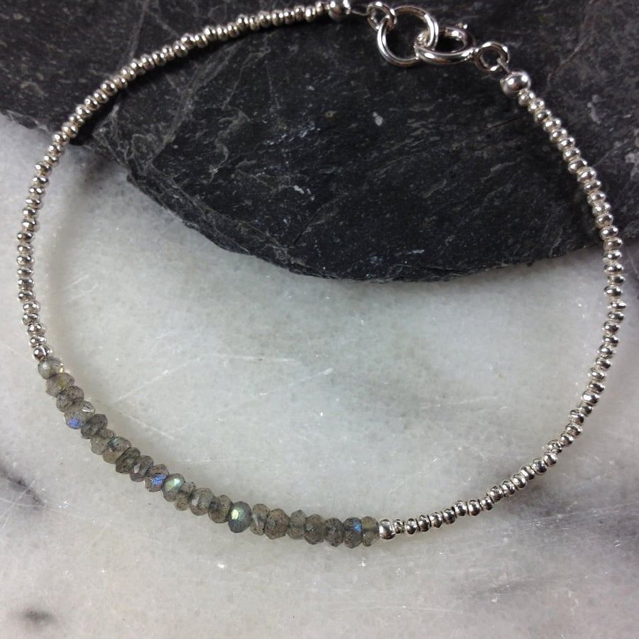 Silver friendship bracelet with faceted labradorite gemstones