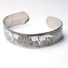 Steel wolf bracelet with celtic knot detail