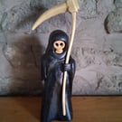 carved wooden Grim Reaper