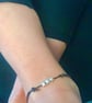 Black Leather Anklet with Tiny Silver Stars - Image 1