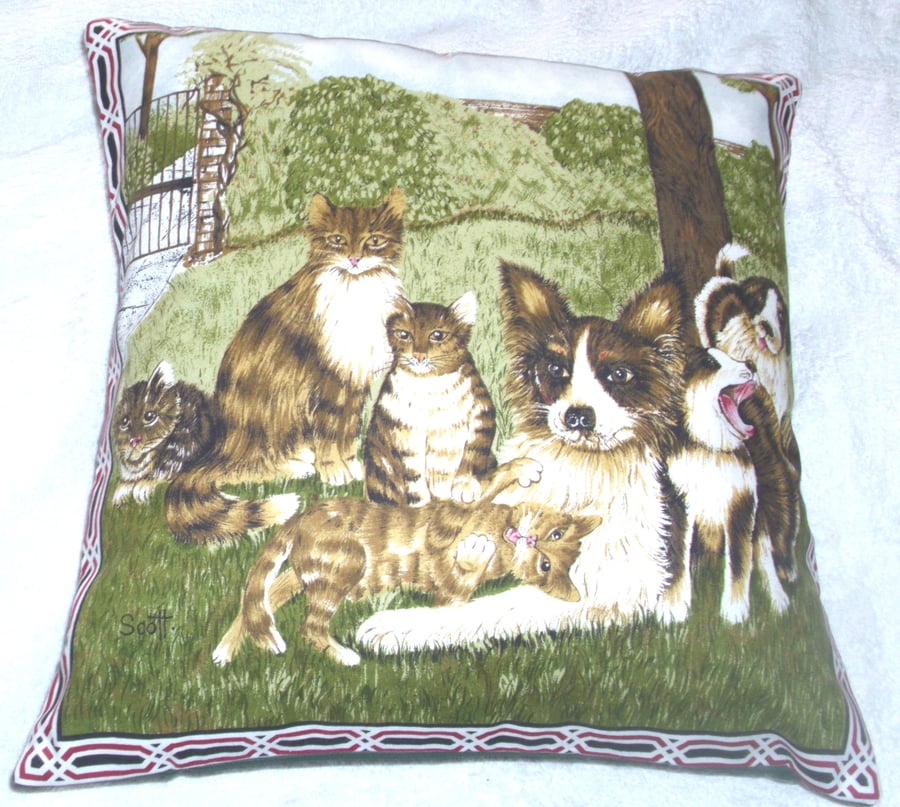 Dogs  and Cats choral meeting in the garden cushion 