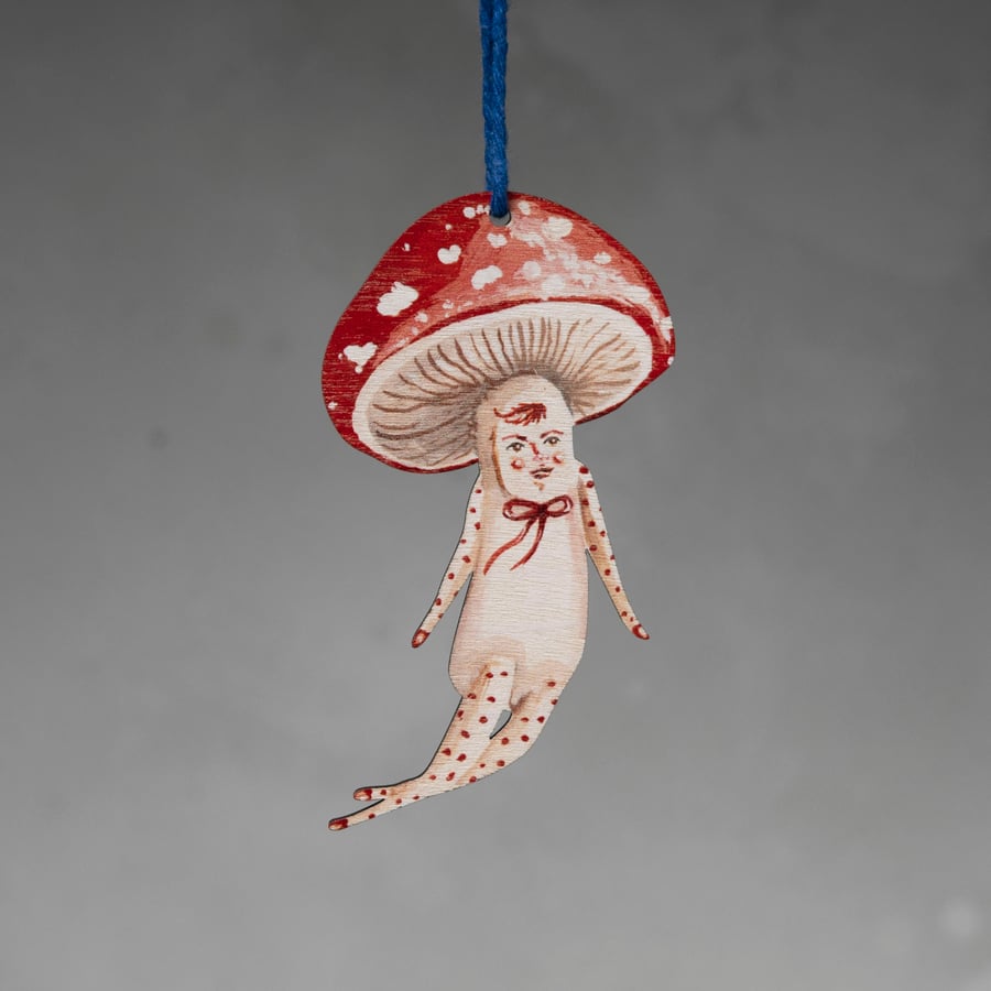 Wooden decoration of a mushroom man called Wilder, double sided