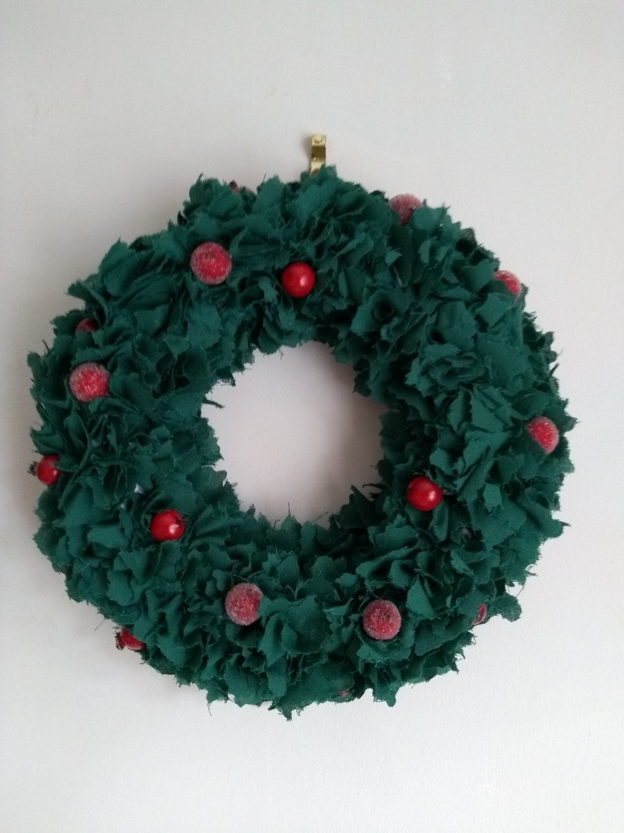 Green fabric Christmas wreath wall hanging