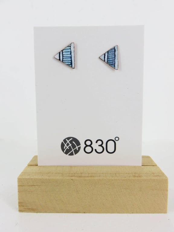 Triangle stud enamels in copper and enamel with hand drawn detail.