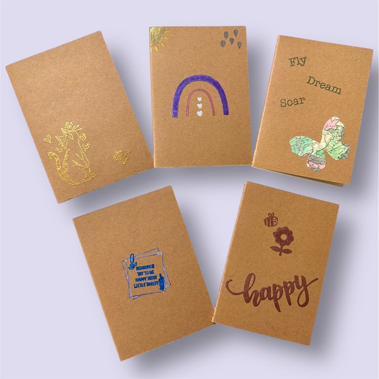 Mini Notebooks, plain cream recycled paper with  5 cover designs. 