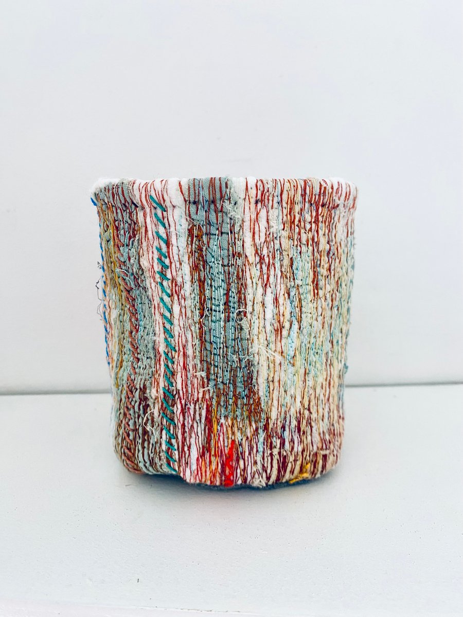 Vibrant textile storage container and pot plant holder