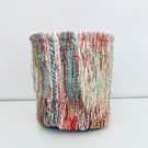 Vibrant textile storage container and pot plant holder