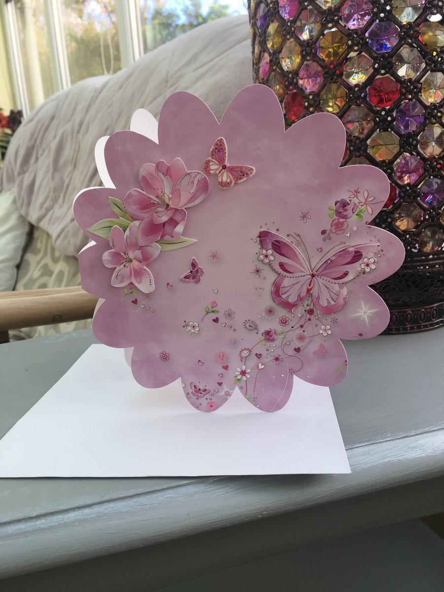 Flower shaped exploding butterfly birthday card