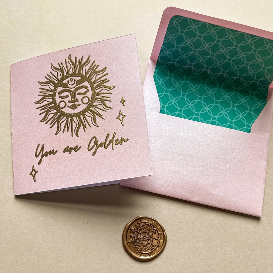 Hand illustrated celestial sun greeting card You are golden card