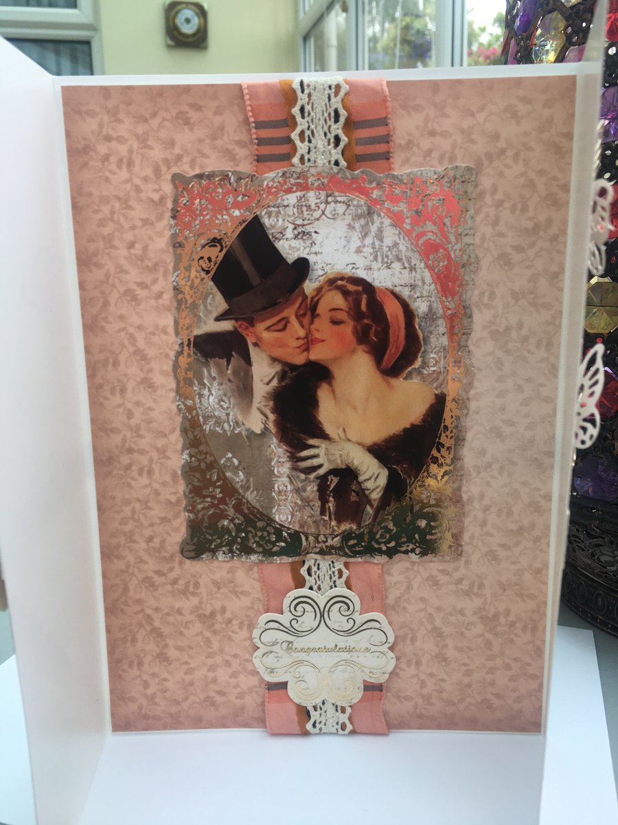 Victorian style kissing couple gate fold wedding card