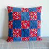 Denim and floral patchwork cushion in reclaimed vintage fabric 1970s inspired