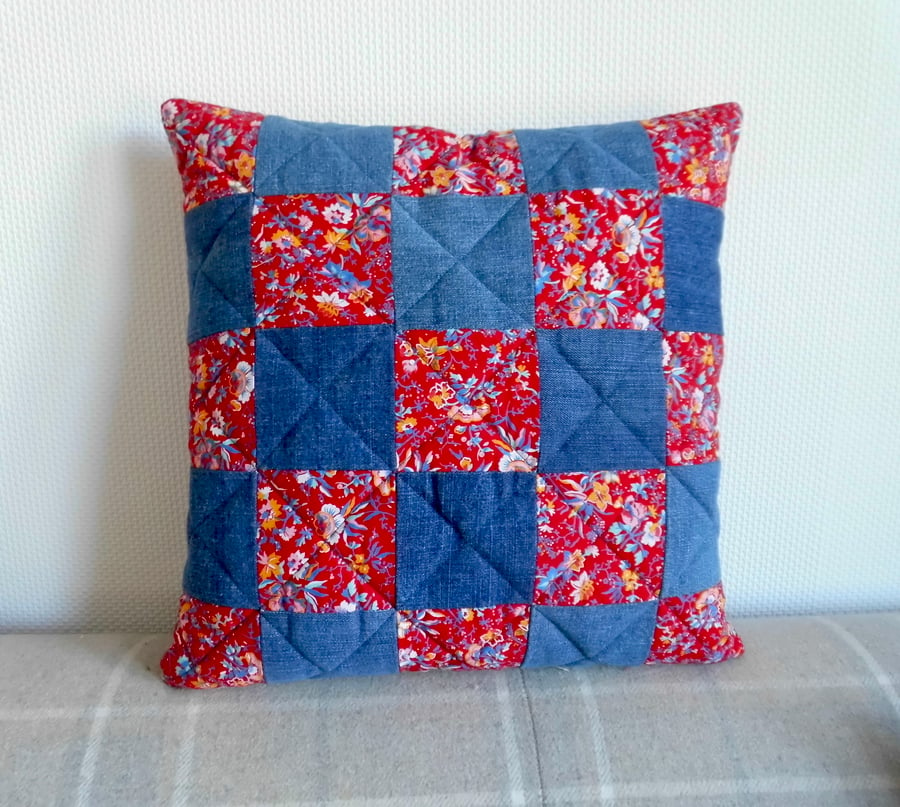 Denim and floral patchwork cushion in reclaimed vintage fabric 1970s inspired