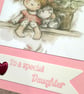Birthday card for a special daughter.  Cute girl sat with her cat and flowers  - Image 2