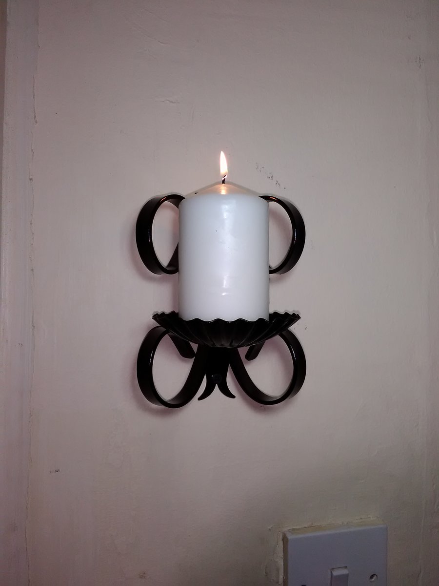 Handmade Wrought iron Wall mounted pillar candle holder. 