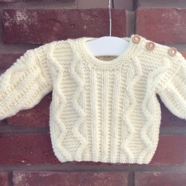 Hand knitted aran baby jumper 