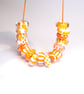 Handmade orange and white patterned lamp work glass beads - Image 5