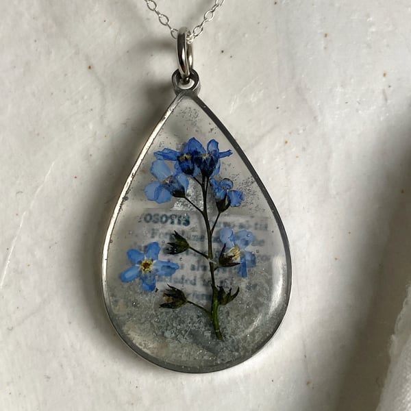 Resin Forget Me Not Pendant Necklace with a Sterling Silver Chain