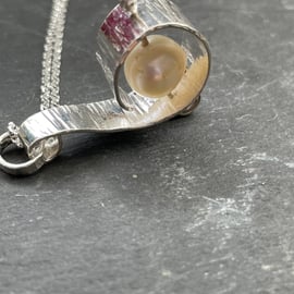 Hand made silver scroll and freshwater pearl pendant 