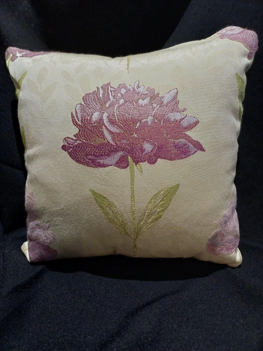 Handmade flower themed cushion