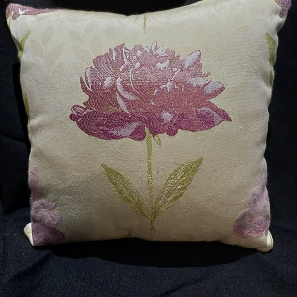 Handmade flower themed cushion