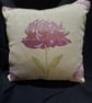 Handmade flower themed cushion