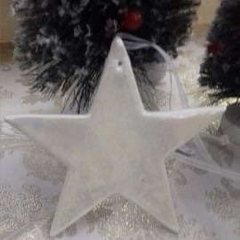 Handmade porcelain paper clay star hanging decoration with mother of pearl lustr
