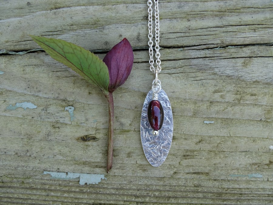 Eco Silver textured oval pendant with garnet