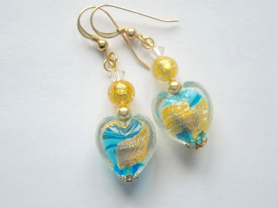 Murano glass turquoise and gold heart earrings with gold filled wires.