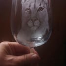 Puma on a wineglass