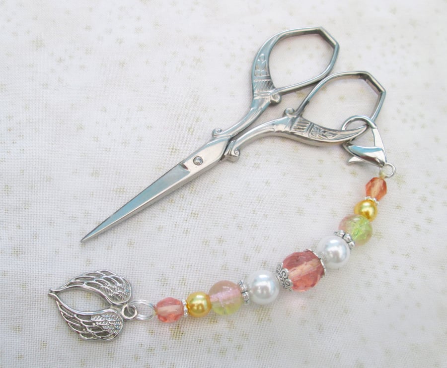 Peach and silver angel wings scissor fob, bag charm or zipper pull