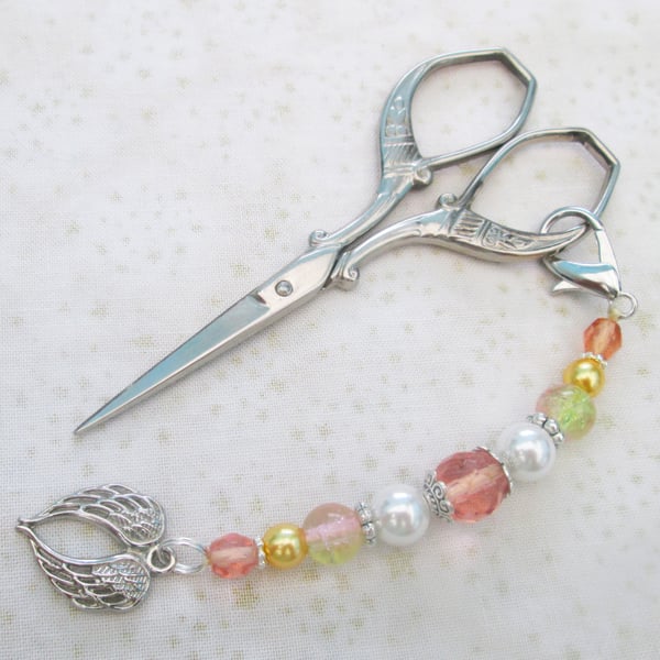 Peach and silver angel wings scissor fob, bag charm or zipper pull