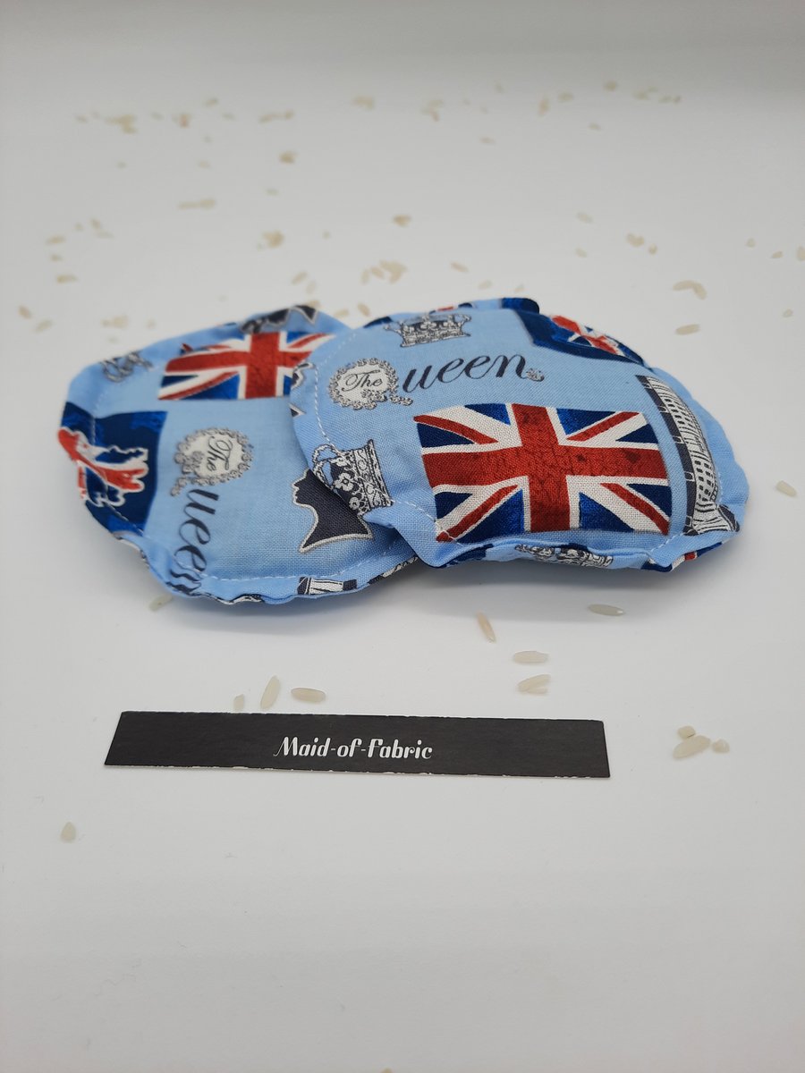 Hand warmers, heat pads rice filled in blue Queens fabric.  