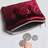Burgundy pouch purse with embossed velvet border and linen design with zip top. 