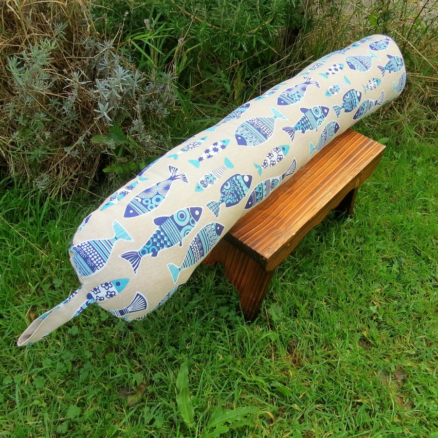 Fish.  A draught excluder with a whimsical fish design.  100% cotton.