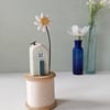 Wooden House on a Vintage Thread Bobbin with Clay Daisy 