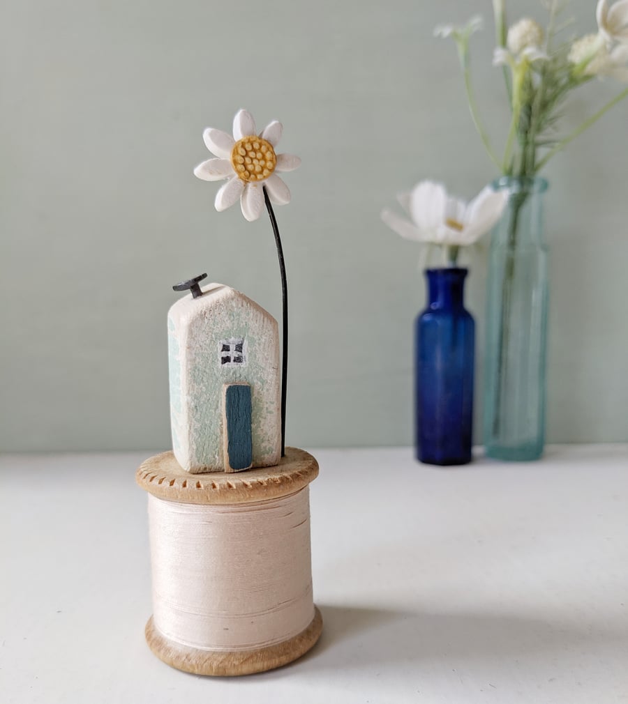 Wooden House on a Vintage Thread Bobbin with Clay Daisy 