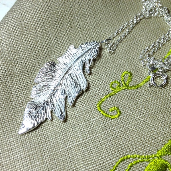 Sterling Silver Feather pendant necklace. 
