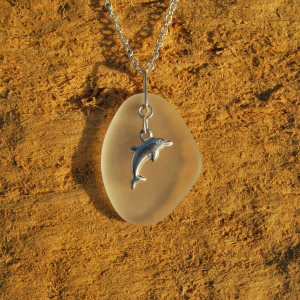 Beach glass pendant with sterling silver dolphin