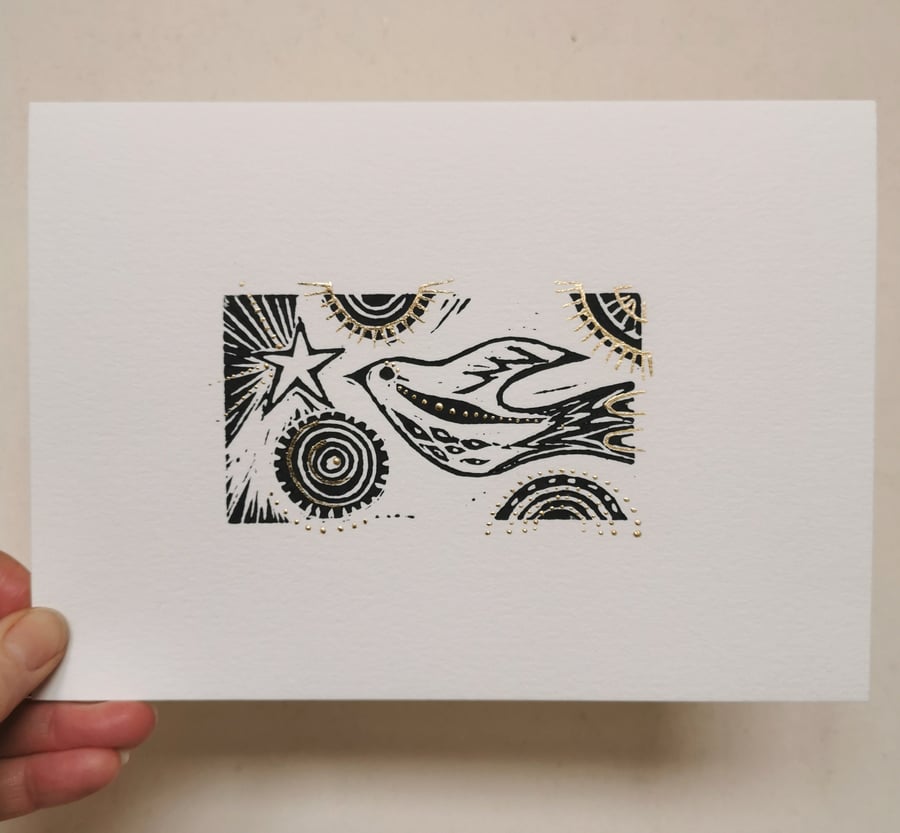Star and Song bird original lino print in gold coloured metal leaf no.4