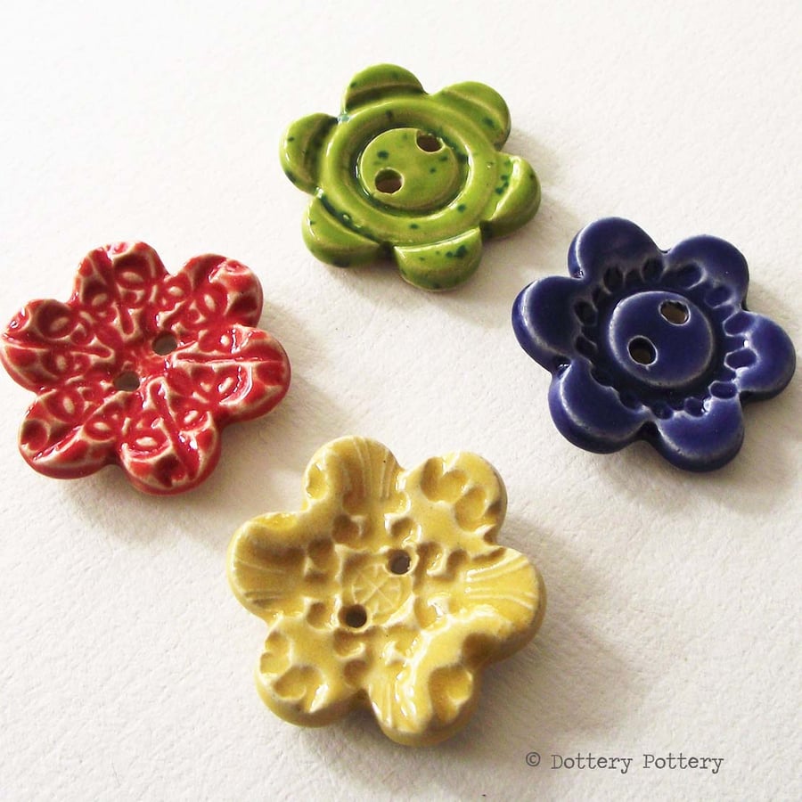 Set of four large flower ceramic buttons bright colours