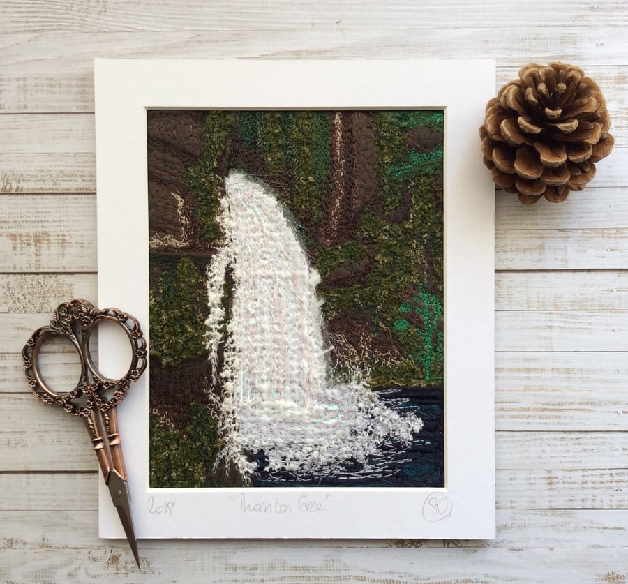 Embroidered waterfall landscape. 