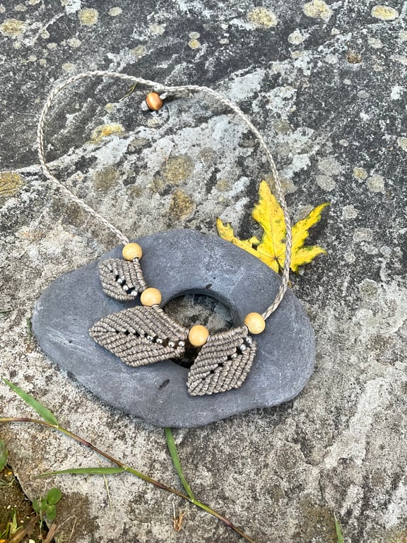 Beige autumn leave necklace with silver bead detail