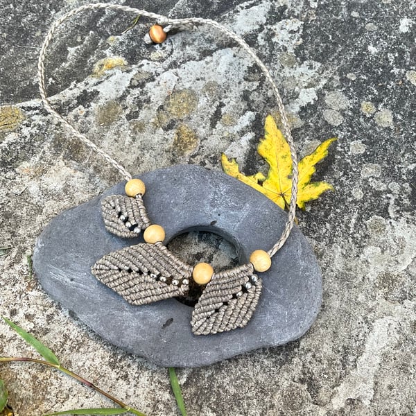 Beige autumn leave necklace with silver bead detail