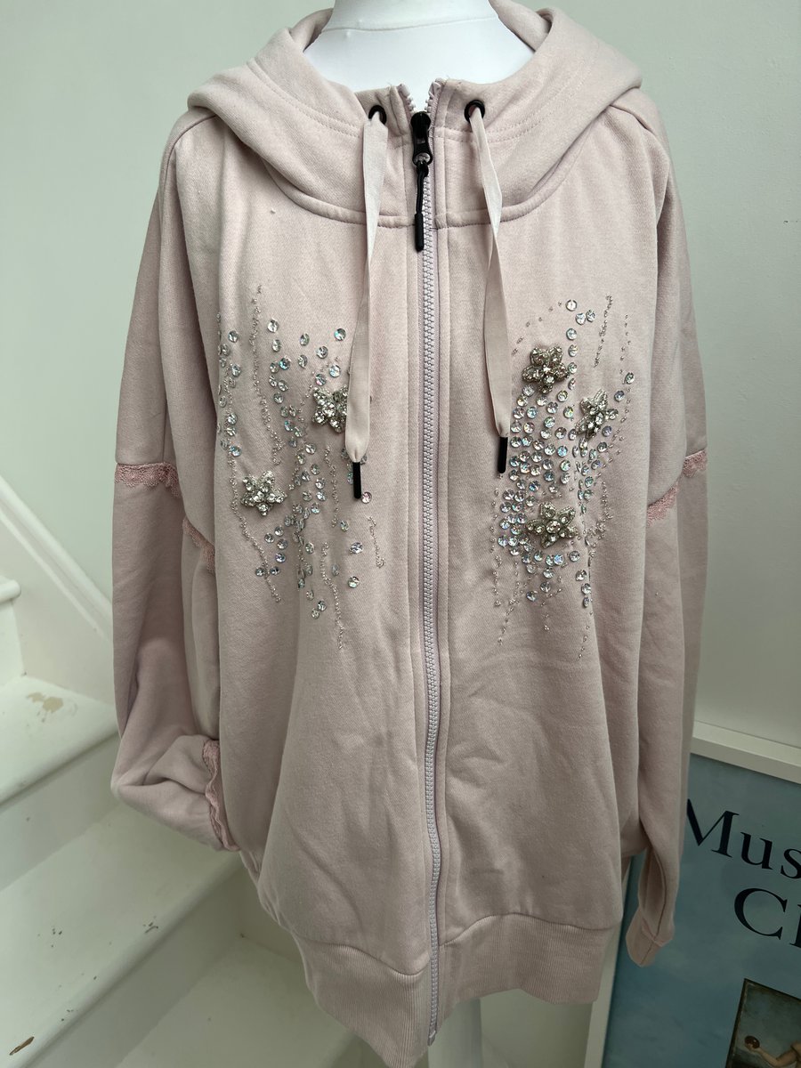 Refashioned pink hoody with sequins and diamond floral decorations