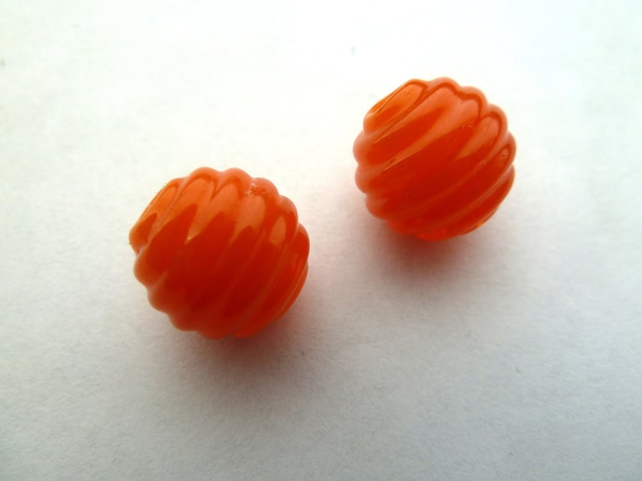 orange ribbed bead pair