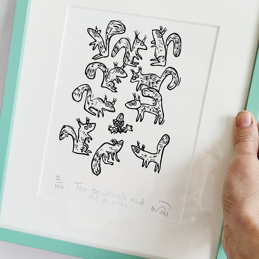 Ten Squirrels and an acorn - lino cut print