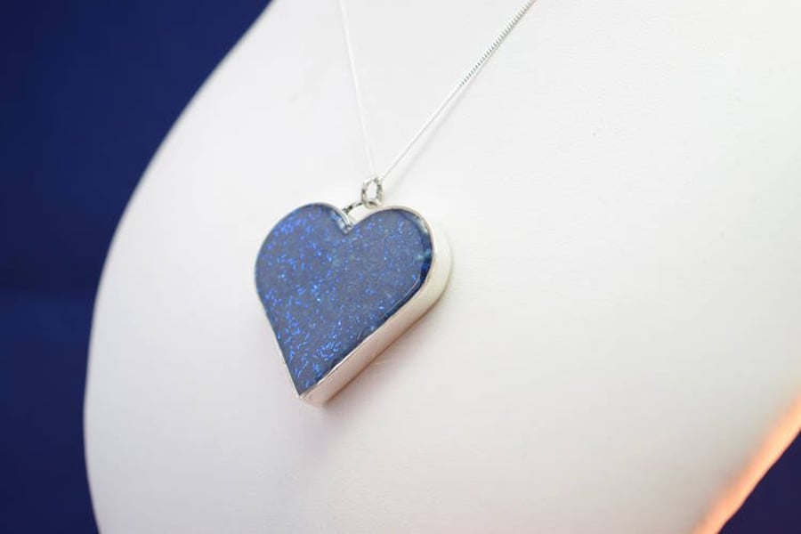 A Blue Shell Resin and Sterling Silver ‘Heart of Ice’ Pendant Necklace