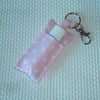 Key ring lip balm holder in pink fabric